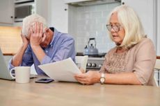 older couple looking at paperwork