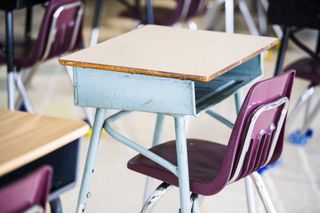 image of school desks in classroom